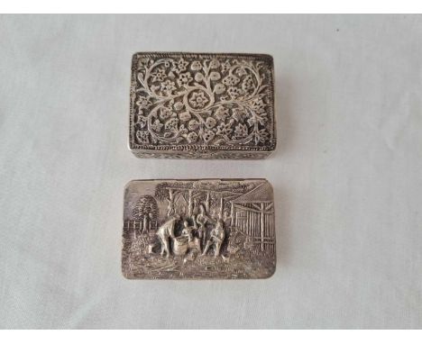 A Danish embossed top snuff box and another eastern 