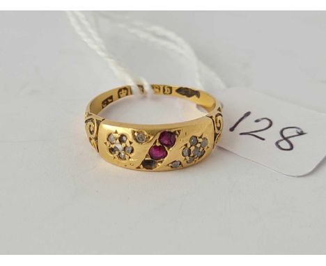 A ruby and diamond band ring (some stones missing) 18ct - size N - 3.2 g.