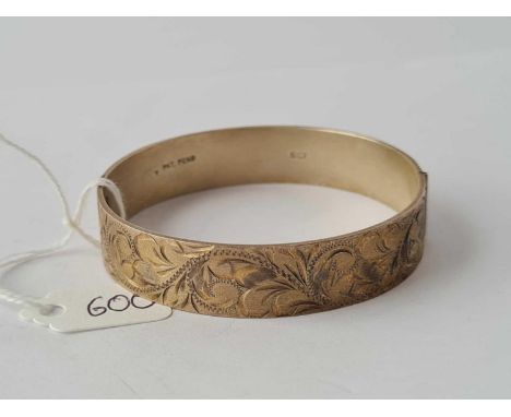A scroll design silver bangle - 29 g.