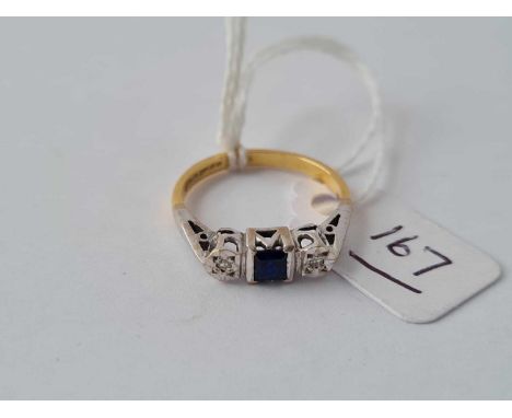 A three stone sapphire and diamond ring set in 18ct - size M