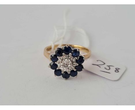 A large sapphire &amp; diamond cluster ring size R 4.4g inc