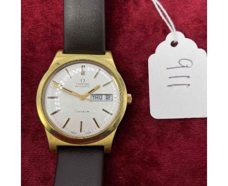 A GENTS OMEGA AUTOMATIC GENEVE WRIST WATCH WITH SECONDS SWEEP AND CALENDAR APERTURE (W/O) 