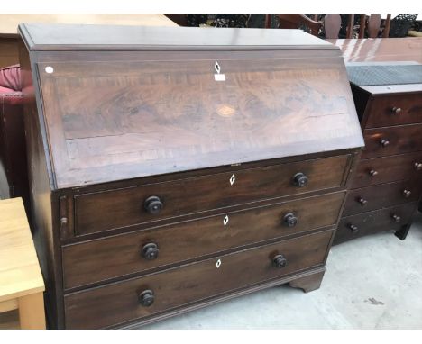 A LARGE INLAID MAHOGANY BUREAU ON BRACKET FEET WITH FALL FRONT AND THREE DRAWERS HAVING BONE ESCUTCHEONS 