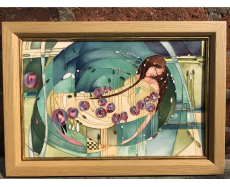 A MOORCROFT POTTERY 'SLEEPING BEAUTY' PATTERN PLAQUE IN LIGHT OAK FRAME, 25 X 35 CM (HEIGHT X WIDTH) UNDERGLAZE 'LINE' TO RIG