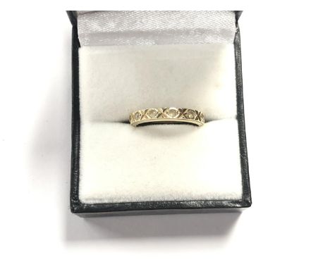 A LADIES YELLOW METAL FULL HOOP ETERNITY RING, BOXED 