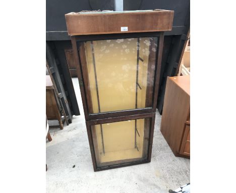 A VINTAGE MAHOGANY SHOP CABINET WITH TWO GLAZED DOORS 