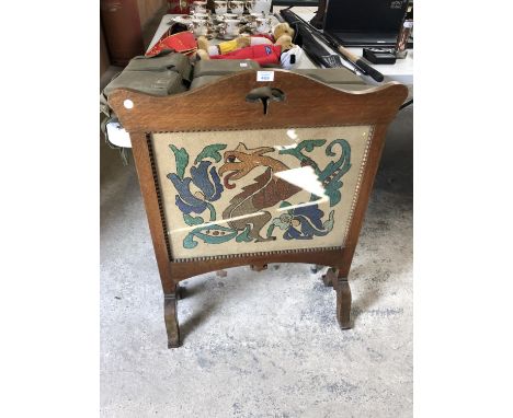 A OAK FRAMED 'ARTS AND CRAFTS' TAPESTRY FIRE SCREEN 