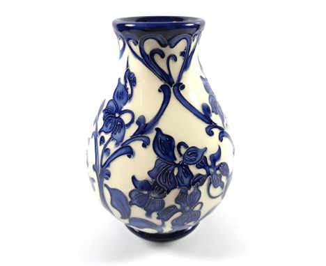 A NUMBERED EDITION MOORCROFT POTTERY 'BLUE VIOLA' VASE, NUMBER 5, HEIGHT 14CM, SMALL CHIP TO BASE 