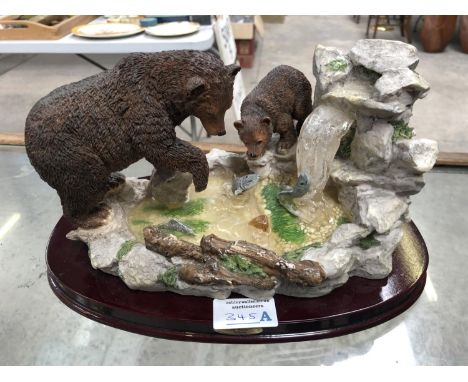 A CERAMIC 'BEARS FISHING' FIGURE GROUP BY THE 'JULIANO COLLECTION' 