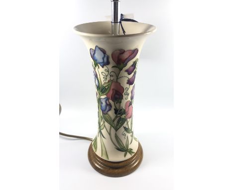 A MOORCROFT POTTERY LAMP BASE IN THE 'SWEETNESS' PATTERN, HEIGHT 38CM INCLUDING FITTING, SMALL CHIP TO RIM 