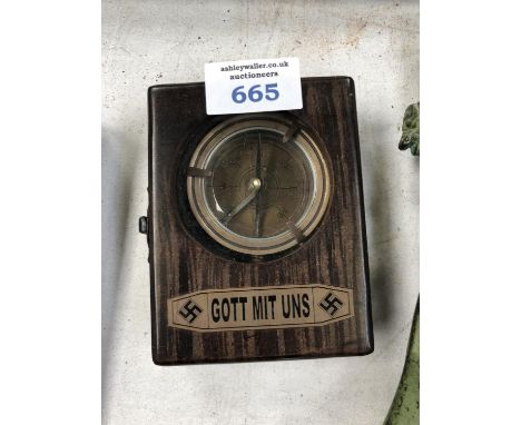 A BOXED BRASS GERMAN COMPASS 