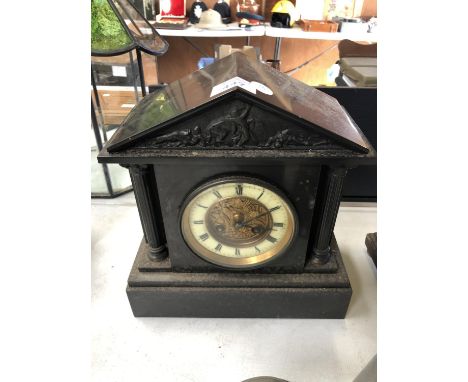 A HEAVY MARBLE AND SLATE MANTLE CLOCK WITH ENAMEL CHAPTER RING AND ROMAN NUMERALS 