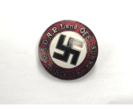 A COLLECTABLE GERMAN ENAMEL BADGE 