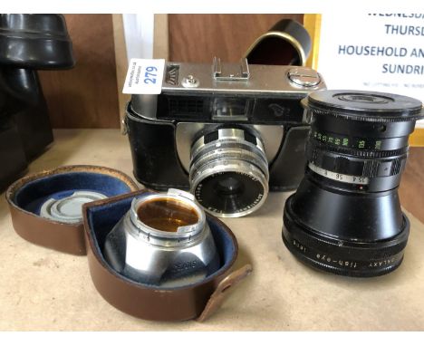 A 'HALINA' VINTAGE CAMERA WITH COLOURED LENS AND FURTHER LENS (3) 