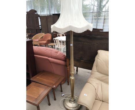 A GILDED STANDARD LAMP 