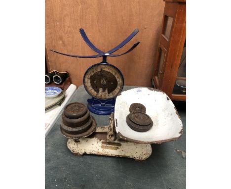 A VINTAGE SET OF WEIGHING SCALES WITH ENAMEL PAN AND WEIGHTS AND FURTHER SET OF SCALES (2) 