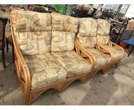 A BAMBOO CONSERVATIVE TWO SEATER SOFA AND TWO ARMCHAIRS 