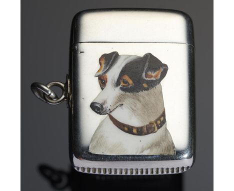A VICTORIAN SILVER AND ENAMEL VESTA CASE  the front with the head of a Jack Russell TERRIER, the reverse engraved  WON AT CAR