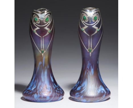 A PAIR OF SECESSIONIST SILVER OVERLAID IRIDESCENT GLASS VASES, BOHEMIAN OR BAVARIAN, C1910 of waisted organic form embedded w