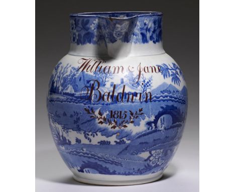 A BLUE PRINTED EARTHENWARE GRAZING RABBITS PATTERN JUG DATED 1815 inscribed in brown enamel William &amp; Jane Baldwin 1815, 
