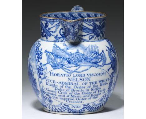 DEATH OF NELSON.  A BLUE PRINTED PEARLWARE COMMEMORATIVE JUG,  C1806-10 with portrait, HMS "Victory" medallion, inscription a