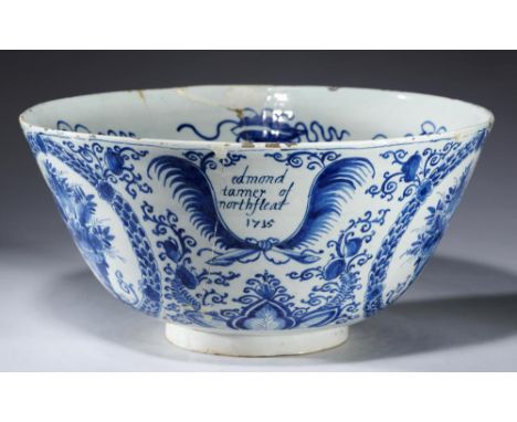 A RARE ENGLISH DELFTWARE PUNCH BOWL, LONDON,  DATED 1715 inscribed Edmond Tanner of Northfleat 1715 in a cartouche and painte