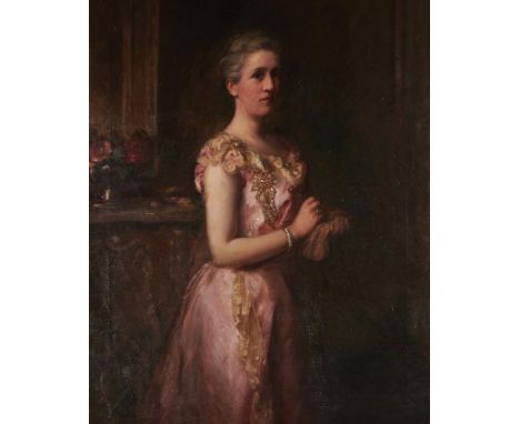 JOSEPH HERBERT BENTLEY, RBA (1866-1934) PORTRAIT OF A LADY three quarter length in a pink dress in an interior, signed and da