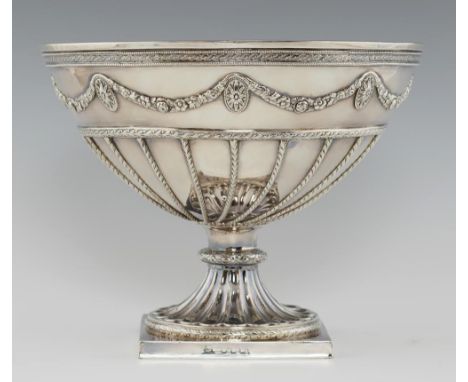 A GEORGE III SILVER PUNCH BOWL of hemispherical form applied with crisply chased festoons and oval paterae, on fluted  foot, 