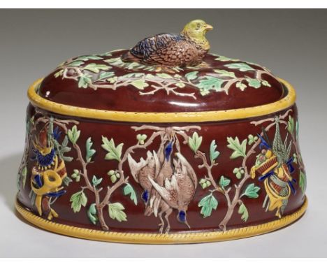 A COPELAND MAJOLICA GAME PIE DISH AND COVER, C1875  with sitting bird knob, 17cm h, impressed marks++Surface graze on bird's 