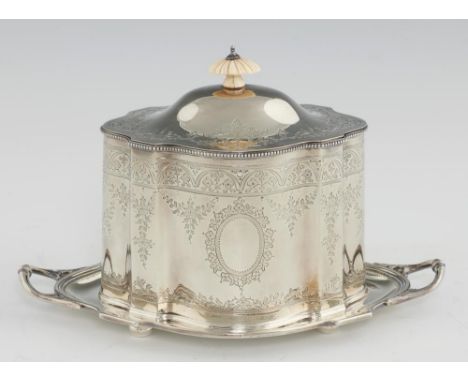 A VICTORIAN SILVER BISCUIT BOX   of straight sided serpentine form with beaded rims and engraved with swags, ivory knop, 17cm