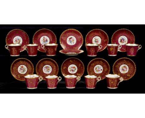 A CHAMBERLAIN WORCESTER GADROONED CLARET GROUND TEA AND BREAKFAST SERVICE, C1840 painted with flowers, one smaller cup  a con