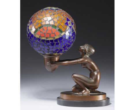 AN ART DECO BRONZED SPELTER FIGURAL TABLE LAMP, C1930   in the form of a semi naked kneeling woman with contemporary glass mo