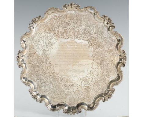 PARLIAMENTARY INTEREST. AN IRISH GEORGE II SILVER SALVER on four feet, later chased, 41.5cm diam, by Christopher Locker, Dubl