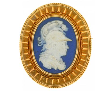 A VICTORIAN GOLD BROOCH WITH A JASPER WARE CAMEO OF A CENTURION 3.6 x 3 cm++Light wear consistent with age 