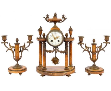 A FRENCH ORMOLU MOUNTED SIENNA MARBLE GARNITURE DE CHEMINEE, LATE 19TH C  the colonnade clock with drum cased movement having