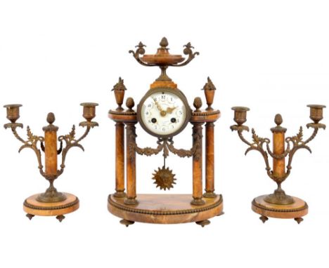 A FRENCH ORMOLU MOUNTED SIENNA MARBLE GARNITURE DE CHEMINEE, LATE 19TH C  the colonnade clock with drum cased movement having