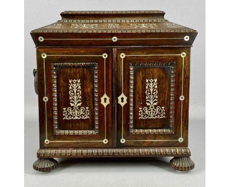 REGENCY ROSEWOOD & MOTHER OF PEARL INSET TABLE CABINET, hinged pagoda top opening to reveal fitted interior above twin panel 
