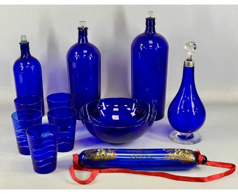 THREE BRISTOL BLUE GLASS CHEMISTS' BOTTLES WITH STOPPERS, 41cms (h) the tallest, circular fruit bowl, 26cms (diam.), rolling 