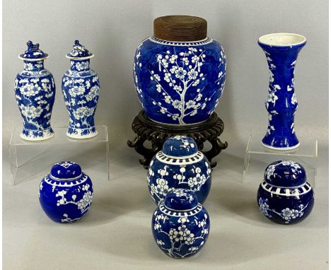 CHINESE 'PRUNUS' GINGER JAR having double ring mark to base, wooden stand and cover, 37cms (h), four other ginger jars, 16cms