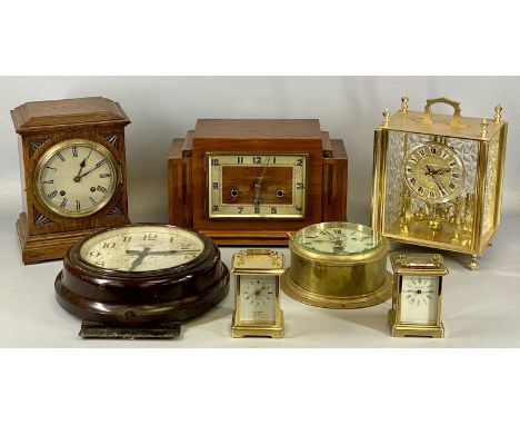 GROUP OF CLOCKS comprising two lacquered brass carriage clocks, 12cms (h), brass cased ship's bulkhead clock, 20cms (h), Smit