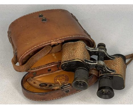 BAUSCH & LOMB BINOCULARS for the US Army Signal Corps, serial no. E877E04, the leather case with compass inset in lidProvenan
