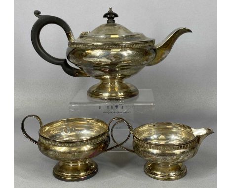 GEORGE V SILVER THREE PIECE TEA SERVICE of circular footed form, teapot with ebonised handle of the finial, Birmingham 1931, 
