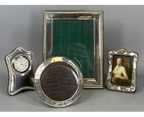 SILVER FACED PHOTOGRAPH FRAME with easel back, 22.5 x 17.5cms (external), silver faced mantel clock by R. Carr with easel bac