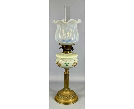 VICTORIAN OIL LAMP with embossed circular brass base and reeded column, floral painted opaque glass reservoir, twin Duplex bu