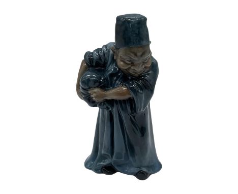 Rare, style 12, experimental titanium glaze figure resulting in a blue and brown colorations. Royal Doulton Titanium backstam
