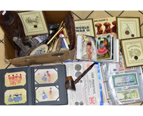 A BOX OF SUNDRY ITEMS to include a folder of world banknotes and coins, a postcard album - mostly topographical, British and 