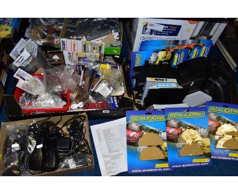 AN EXTENSIVE COLLECTION OF SCALEXTRIC TRACK AND ACCESSORIES, to include Dunlop Bridge, Grandstand (C8230), Control Tower (C83