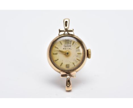 A 9CT GOLD WATCH CASE, hand wound, circular discoloured dial signed 'Tudor Royal', Arabic and baton markers, gold tone hands,