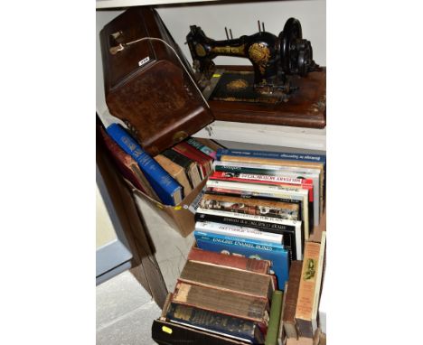 A LATE VICTORIAN WALNUT CASED JONES 'FAMILY C.S' SEWING MACHINE, serial no 85032, together with two boxes of books, titles in