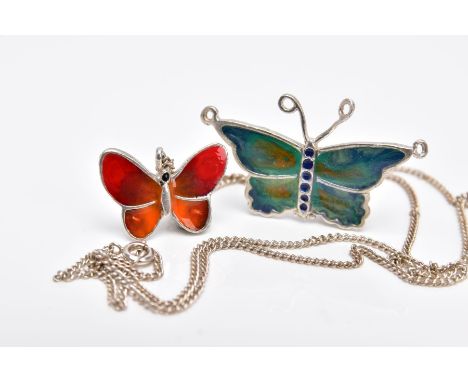 TWO WHITE METAL AND ENAMELLED BUTTERFLY PENDANTS AND A CHAIN, the first butterfly pendant decorated with red and orange ename